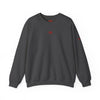 Gray sweatshirt with a red heart design on a white background