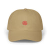 Beige cap with red logo on a white background