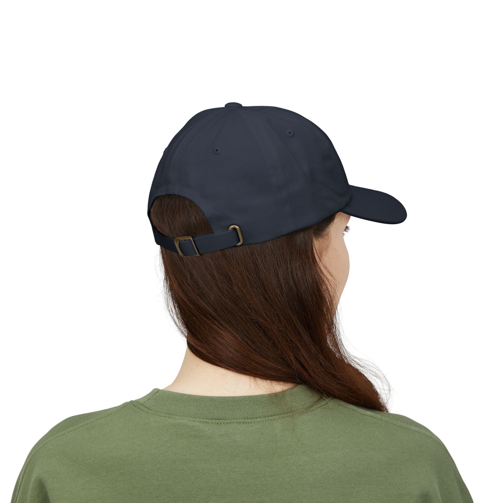 Person wearing a navy blue cap on a white background