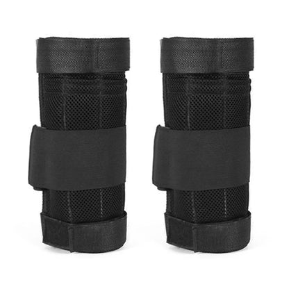 Pair of black protective wrist guards on a white background