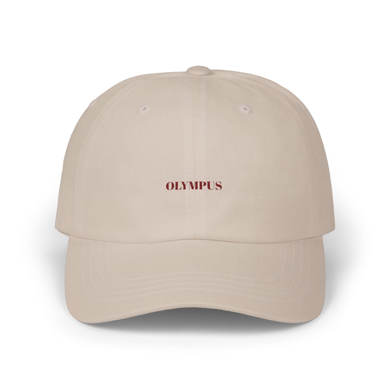 Beige cap with 'OLYMPUS' logo on a white background